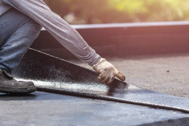 Professional Basement Waterproofing technician working in Jamestown, NY